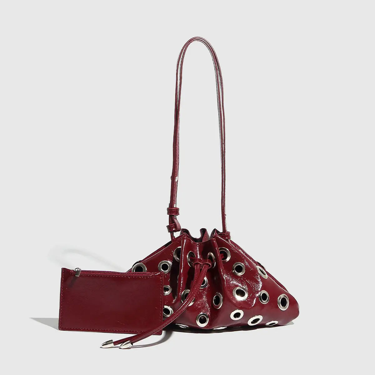 METAL EYELET BUCKET BAG