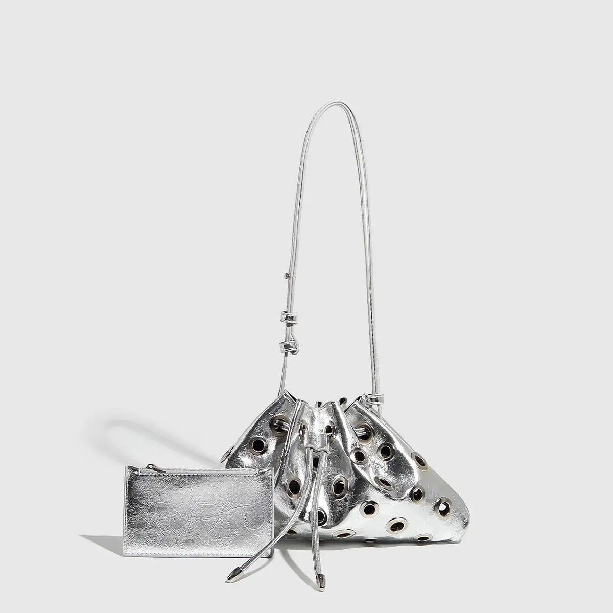 METAL EYELET BUCKET BAG