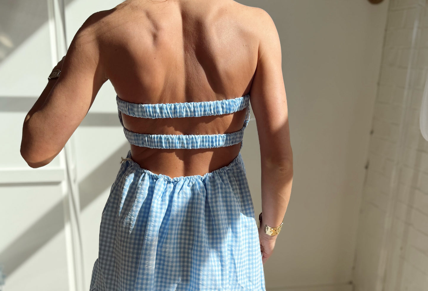 STRAPLESS TWIST MINI DRESS