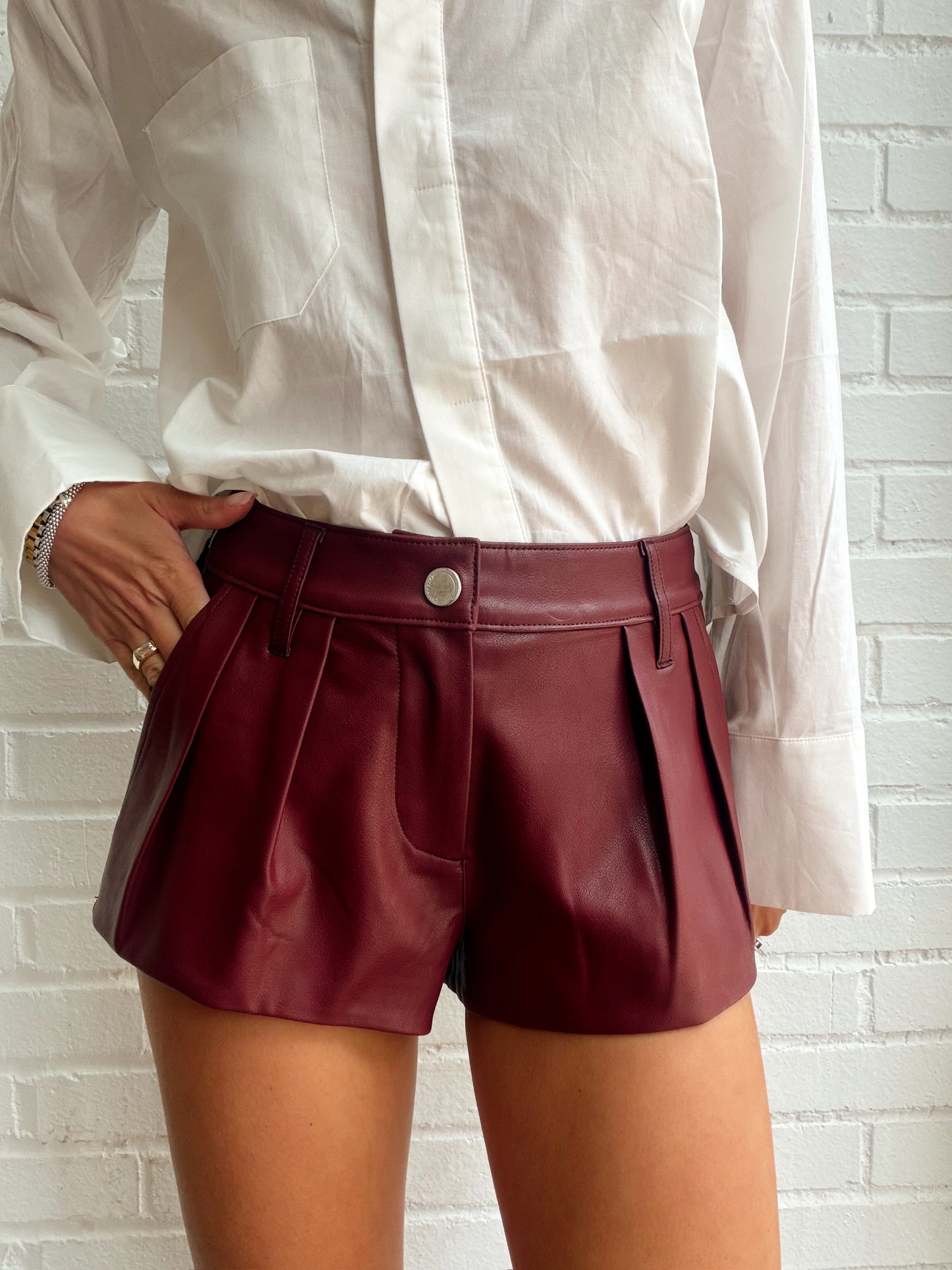FAUX LEATHER PLEATED HOT SHORTS
