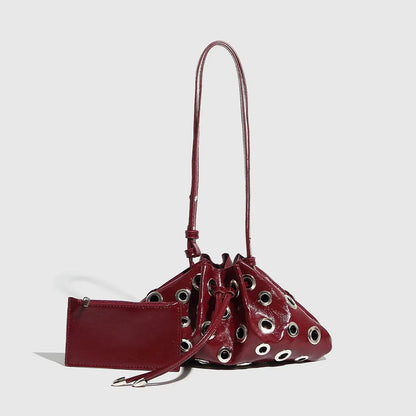 METAL EYELET BUCKET BAG